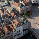 an aerial view of a city with a river running through it